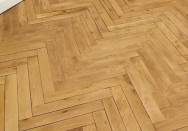 Rénovation de parquet à bâton rompu sur-mesure à Lyon (69)